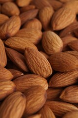 Pile of delicious raw ripe almonds, closeup