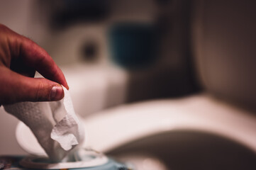 Disposable wipes being flushed down a toilet where they can cause clogging and problems with...