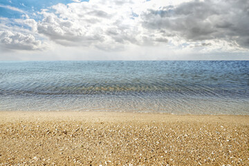 Beautiful view of seascape and blue sky with white clouds on sunny day