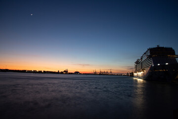 Fototapeta premium Cruise ship in the terminal at night