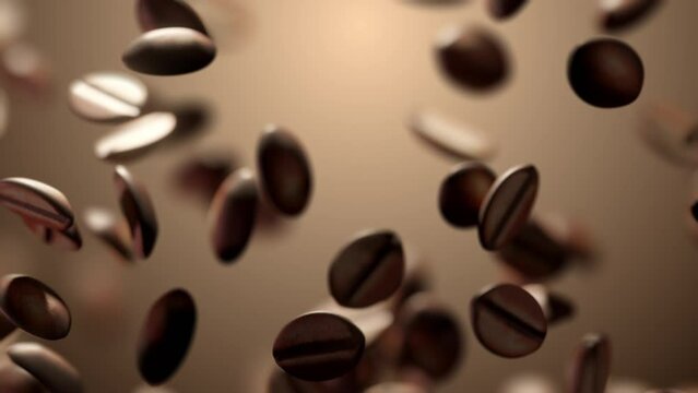 Super slow motion shot of falling roasted aromatic coffee beans
