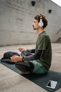 One Man Doing Guided Meditation Online Yoga Self Care Concept Outdoor