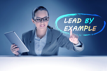 Businesswoman in lead by example concept