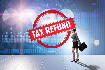 Businesswoman in tax refund concept