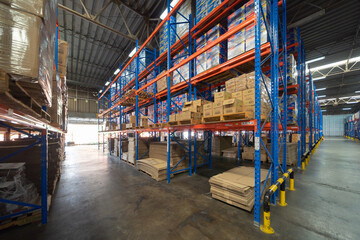 Interior of large warehouse retail store industry. Rack of furniture and home accessories stock storage. Interior of cargo in ecommerce and logistic concept. Depot