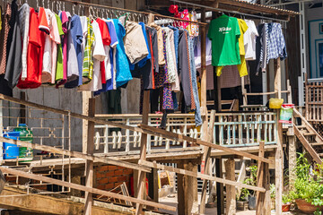 Clothes hanging under a veranda of a house in Chau Doc, Vietnam