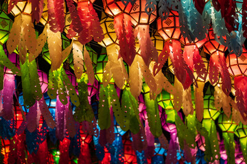 Colorful lanterns Hanging on a wire in the temple of Lamphun, Thailand in the Lantern Festival.