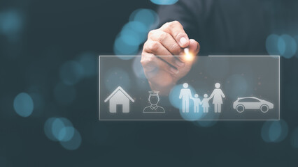 man holding pen and virtual icon,family and property security concept,symbol of life insurance,health and financial confidence,protecting and caring for loved ones,planning and risk management