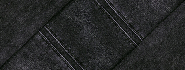Part of dark jeans.