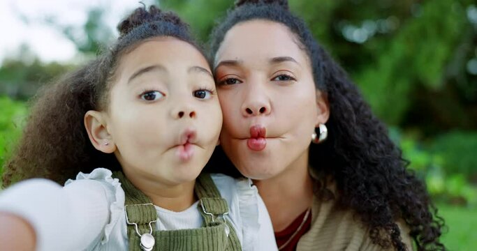 Selfie, happy and mother and girl in park with silly kiss face for summer, bonding and social media. Family, funny and garden with mom and child in countryside for relax, weekend and spring lifestyle