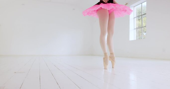Ballet, dance and dancer studio with a student getting ready for fitness and workout in a studio. Ballerina performance artist, young woman and dancing of a girl tie shoes for training and exercise