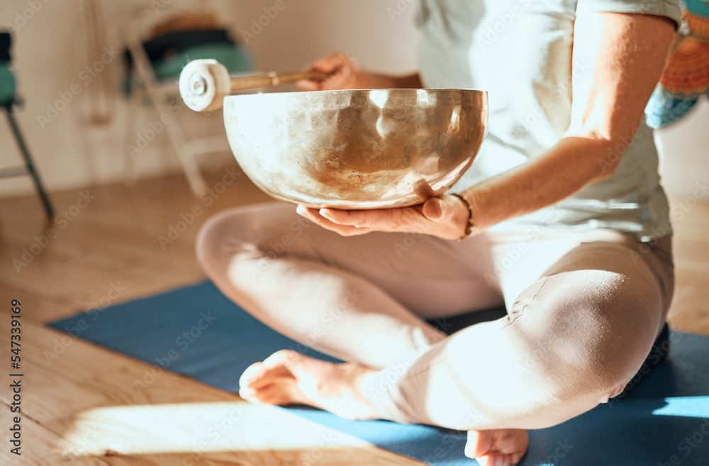 Poster Yoga, tibetan bowl and hands of woman in meditation, sound therapy and healing with zen, ambient and peace on a floor. Wellness, singing bowl and lady practice mind, energy and inner peace in India