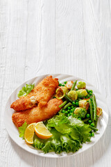 Crispy Beer Batter Cod Fish with green  vegetables