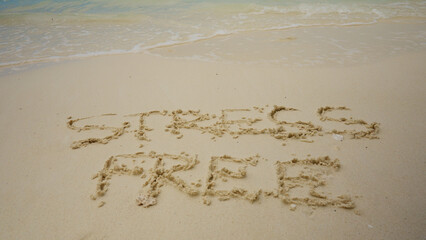 Stress Free Zone Written On Sand Near The Sea
