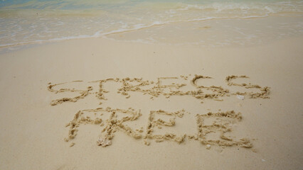 Stress Free Zone Written On Sand Near The Sea