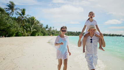 Family With Child Daughter Together On Beach