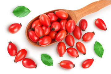 Rose hip in wooden spoon isolated on a white background with full depth of field. Top view. Flat lay.