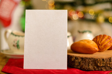 Naklejka na ściany i meble Blank postcard with decorative Christmas elements in the background. Christmas card mockup.