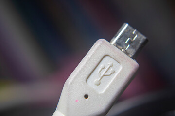 Close-up of a USB cable port with clear detail, showing modern technology and connectivity concept....