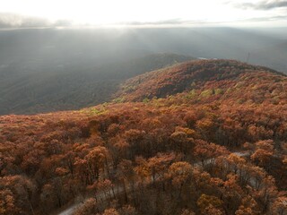 Aerial photo of Georgia Mountains during a beautiful fall sunset with sunrays