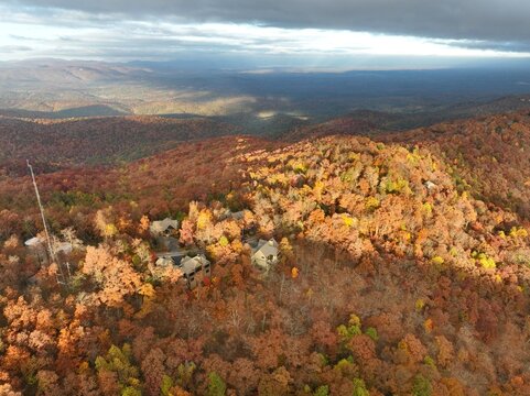 Aerial photo of Georgia Mountains 
homes during a beautiful fall sunset on Big Canoe