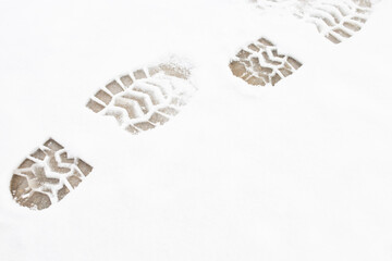 Human footprints in the snow close up. beautiful winter background