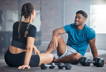 Fototapeta na wymiar Fitness, exercise and couple talking after gym. workout while on floor for communication and conversation about health, motivation and wellness. Personal trainer man and woman together for training