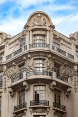 Fototapeta premium Architectural detail of neoclassical buildings in Istanbul. Facade parts. Windows of houses in art nouveau style.