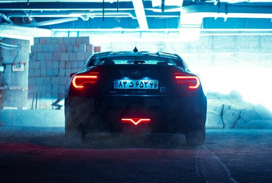 Back view of GT86 Toyota sports car in garage