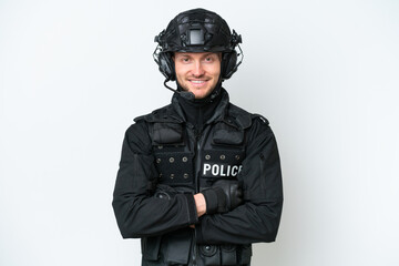 SWAT man over isolated white background keeping the arms crossed in frontal position