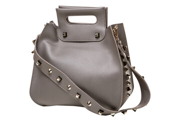Gray women's bag with a long handle and decorative gold rivets, isolate