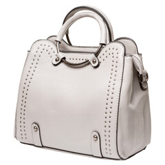 Beige leather women's bag with metal handles, isolate