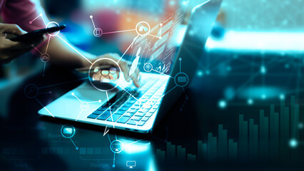 Business working using laptop  on Futuristic virtual screen interface Technology. networks internet connection Wireless devices around the world Information technology is essential for businesses.