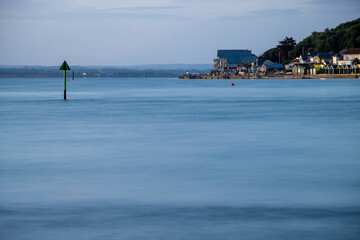 Sunset over the solent with calm summer seas and still waters