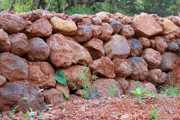 fence wall constructed from large stones