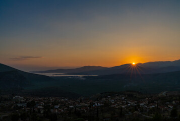 sunset view of the village of Chrisso and the Crissaean Gulf in Central Greece