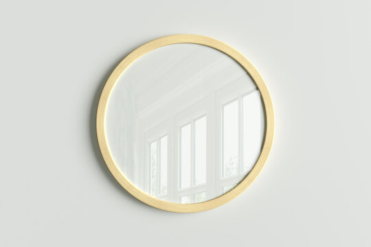 Wooden round frame poster mock up on the white wall.