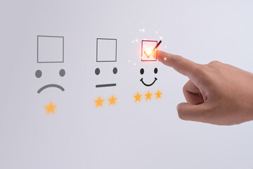 Business people or customers show satisfaction through the application on the touch screen. By giving the most or the best satisfaction rating.Customer service satisfaction survey concept