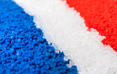 blue white red France flag colour by PVC polymer in chemical laboratory for research in polymer chemical petrochemical and petroleum technology industry produce polymer for chemical material business