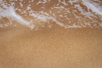 Sand beach and waves