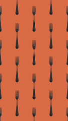 pattern. Fork top view on red orange background. Template for applying to surface. Vertical image. Flat lay. 3D image. 3D rendering.