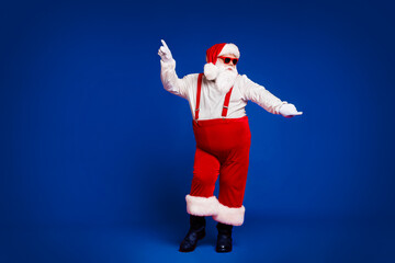 Full length body size view of his he attractive cool funny playful fat white-haired Santa having...