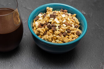 Healthy homemade muesli in a blue bowl