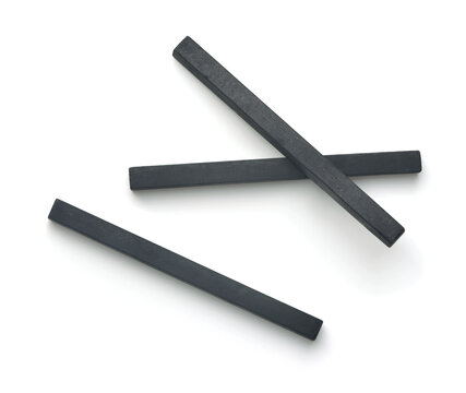 Top view of compressed charcoal drawing sticks