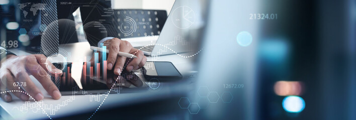 Data analysis, Business intelligence, Planning and strategy, digital technology. Programmer using tablet analyzing financial data on futuristic virtual interface. Global business development