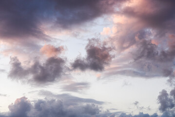 time lapse of clouds over sunset