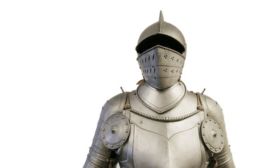 Knight in metal armor on a light background at the exhibition.