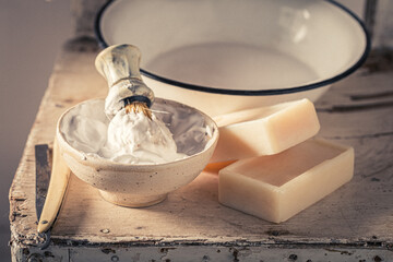 Old and unique barber equipment with razor and soap.
