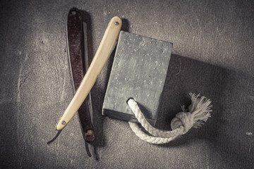 Antique and traditional tools for shave with foam and brush.