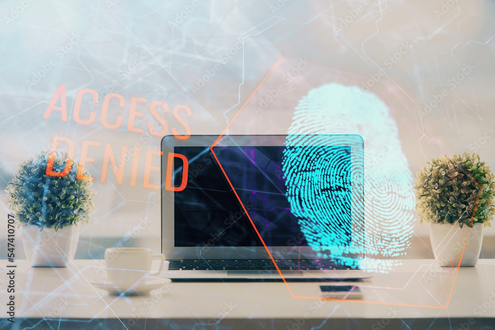 Poster Computer on desktop in office with finger print drawing. Double exposure. Concept of business data security.